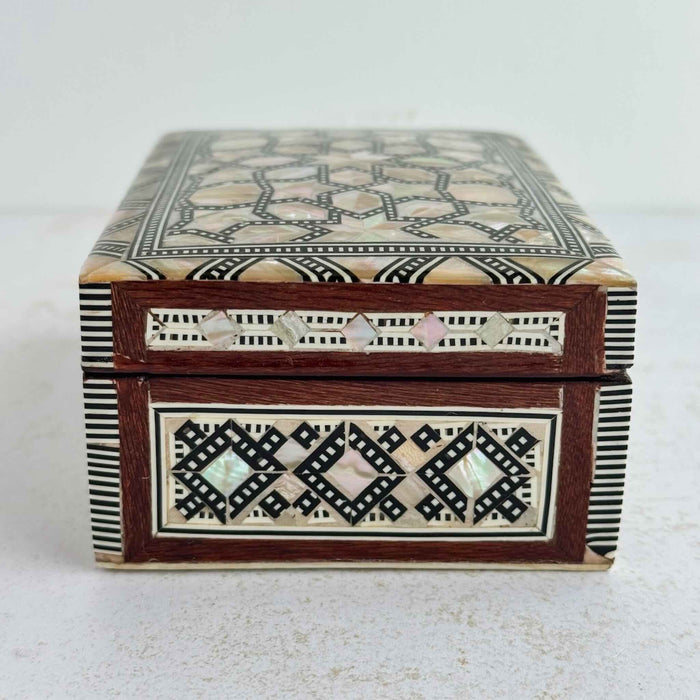 End side of inlaid wood box