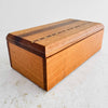 Three-quarter view of inlaid wood box