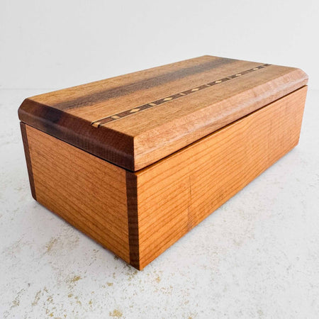 Three-quarter view of inlaid wood box