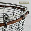 Close-up of the separate wire loops supporting the swinging handle above the twig rim, labeled “double loop detail.”