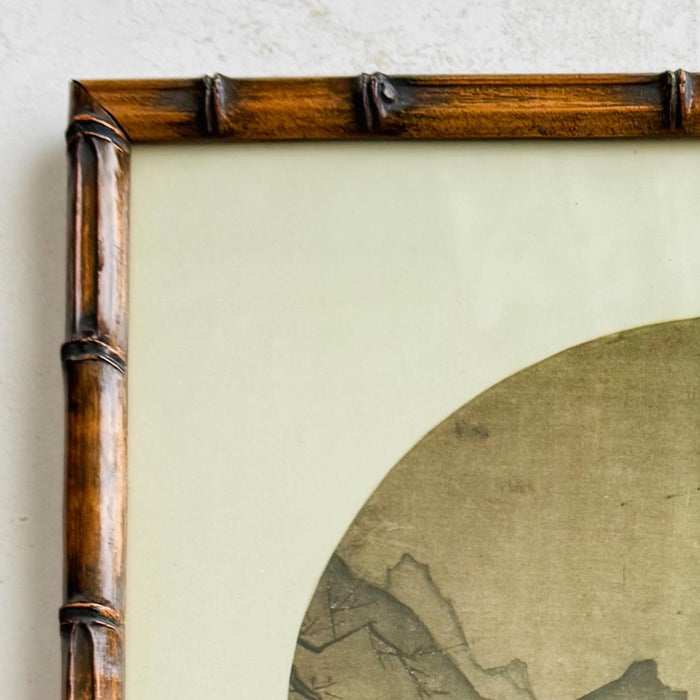 Close-up of bamboo frame corner on print of Chinese painting
