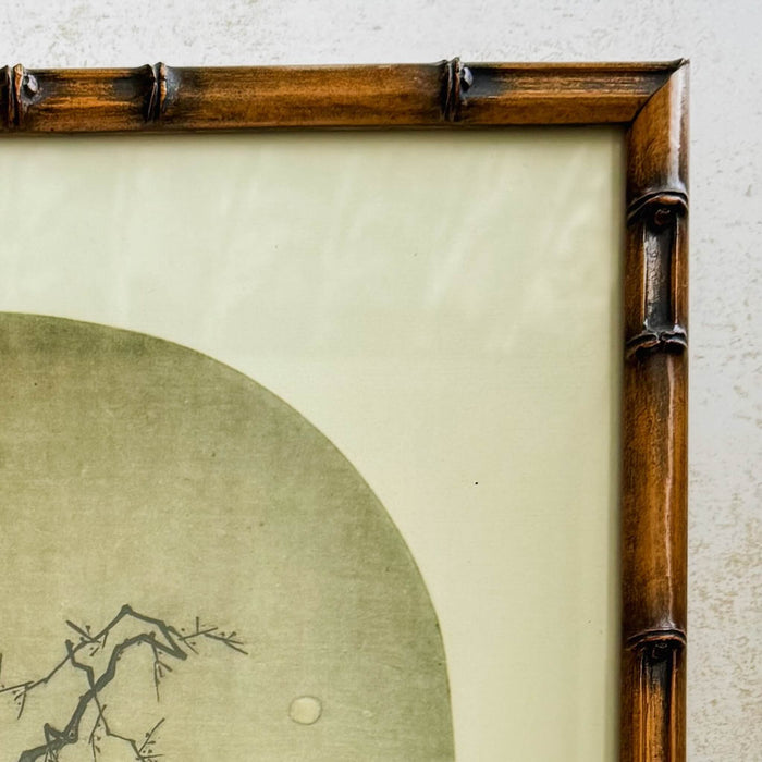 Close-up of bamboo frame corner on print of Chinese painting
