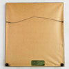 Back of framed embroidery showing brown paper, hanging wire, and label