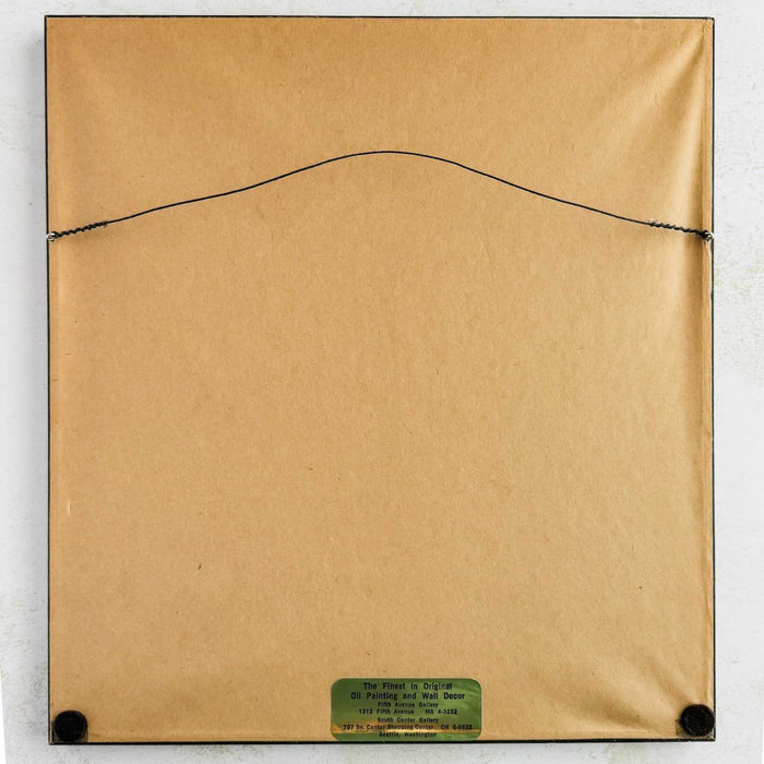 Back of framed embroidery showing brown paper, hanging wire, and gallery label
