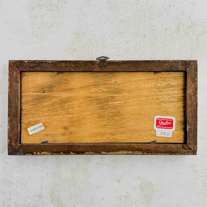 Back of Italian art showing wood back and frame and two labels