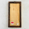 Back of framed Italian floral still-life showing wood frame and back and two labels