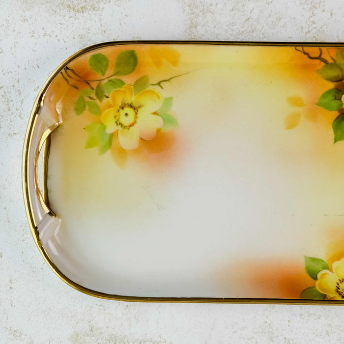 Left-hand side of antique yellow rose tray