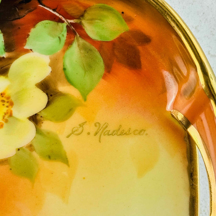 Close-up of antique yellow rose tray S. Nadesco signature on tray front