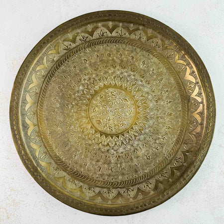 Full view of engraved round brass moroccan tray showing intricately detailed decoration