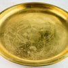 Slightly zoomed in view of vintage engraved brass tray