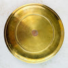 Back view of vintage engraved brass tray showing maker's mark
