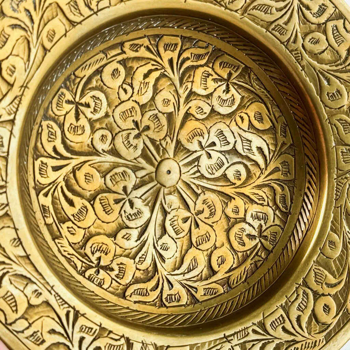 Close-up of vintage brass dish 2 floral engraving
