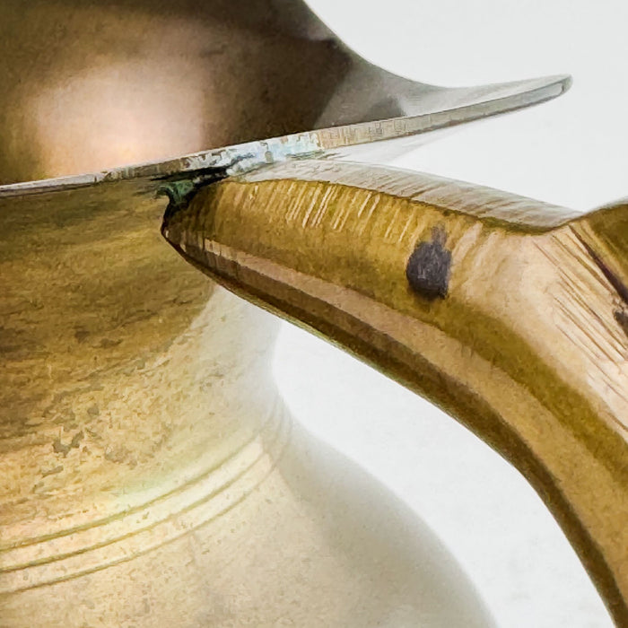 Close-up view of top of handle showing a dark spot