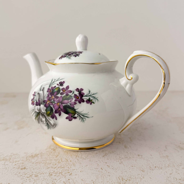 Three-quarter view of Royal Grafton purple violets teapot