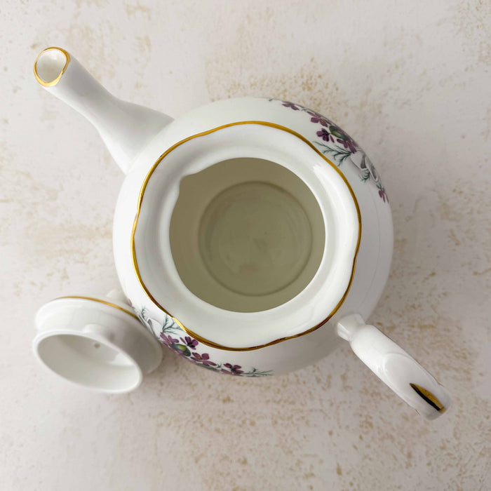 Top down view showing opening and Interior of Royal Grafton purple violets teapot