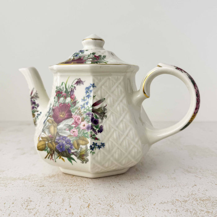 Three-quarter view of Sadler Windsor floral basket weave teapot
