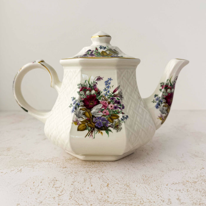 Back view of Sadler Windsor floral basket weave teapot