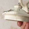 Close-up showing crack on Sadler Windsor floral basket weave teapot lid exterior