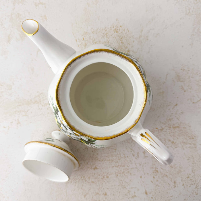Top down view showing interior of Royal Albert White Dogwood teapot