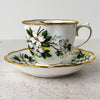 Side view of Royal Albert White Dogwood teacup and matching saucer