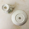 Bottom view of Royal Albert White Dogwood teacup and matching saucer