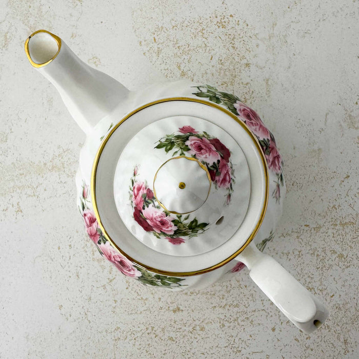 Top down view of pink and burgundy rose Heirloom teapot