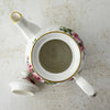 Top down view showing interior of pink and burgundy rose Heirloom teapot