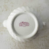 Bottom of pink and burgundy rose Heirloom teapot
