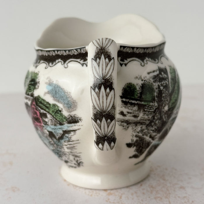 Handle end view of Johnson Bros Friendly Village creamer
