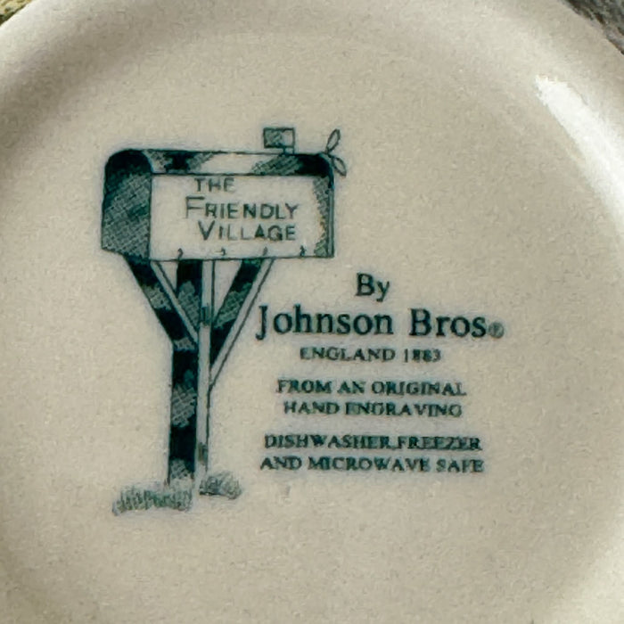 Close-up of Johnson Bros Friendly Village creamer backstamp