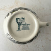 Bottom view of Johnson Bros Friendly Village creamer