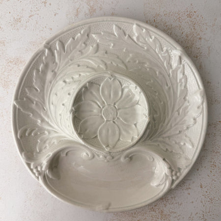 Front view of Gien White Majolica artichoke plate