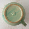 Bottom of green Monmouth ribbed stoneware creamer