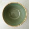 Top down view showing opening and interior of green Over and Back yellowware bowl 