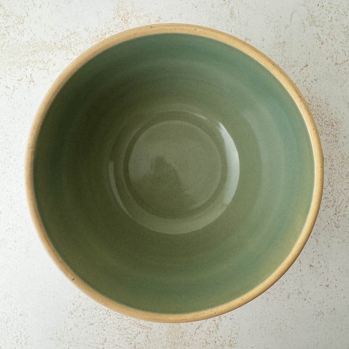 Top down view showing opening and interior of green Over and Back yellowware bowl 