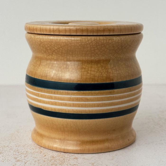 Side view of Park Designs yellowware canister