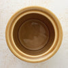 Top down view showing opening and interior of Park Designs yellowware canister