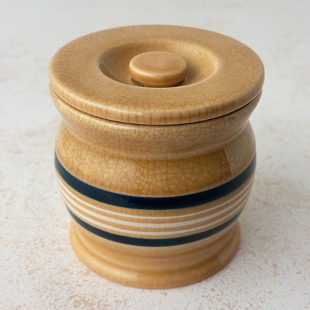 Three-quarter view of Park Designs yellowware canister