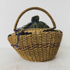 Front view of antique wicker vanity basket with beaded hexagonal form