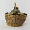End view of antique wicker vanity basket with beaded hexagonal form