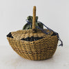 Opposite end view of antique wicker vanity basket with beaded hexagonal form
