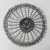 Bottom view of vintage handwired shallow round wire basket