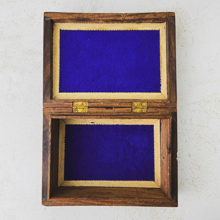 Top down view showing interior of box and lid of vintage tree of life wooden box