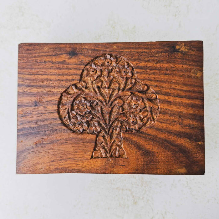 Top down view of vintage tree of life wooden box