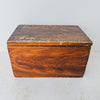 Angled view of antique primitive storage box with faux grain paint finish