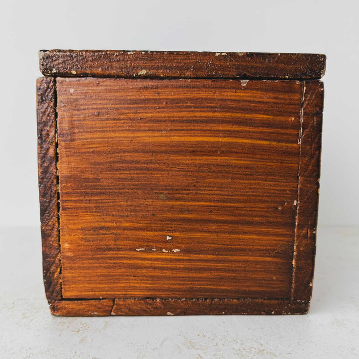 End view of antique primitive storage box with faux grain paint finish