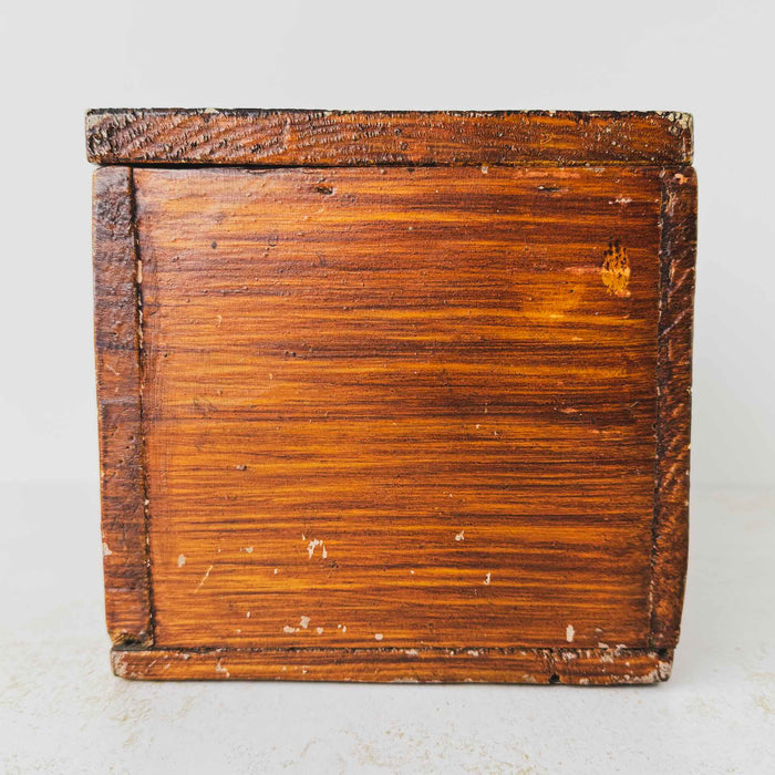 Opposite end view of antique primitive storage box with faux grain paint finish