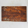 Top down view of antique primitive storage box with faux grain paint finish