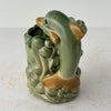 Back of dolphin view on vintage majolica style dolphin cachepot