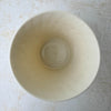 Top down view showing opening and interior of Lenox cachepot with embossed leaf design
